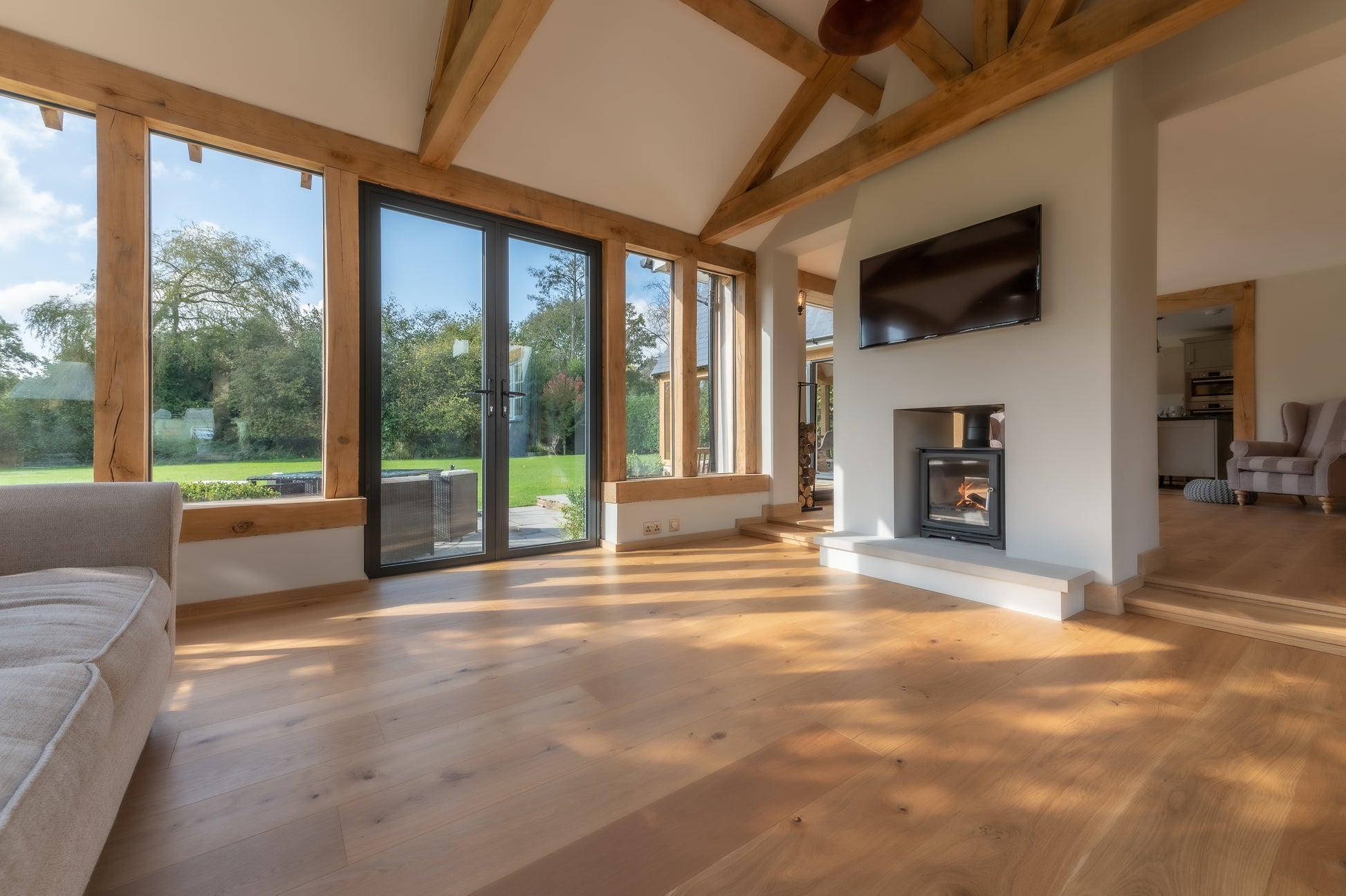 Deco Natural Oak engineered wood planks in a sunny orangery