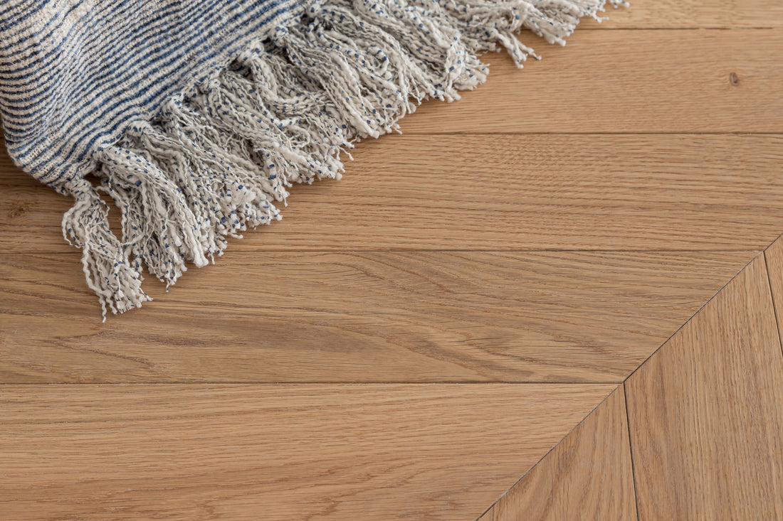 rustic grades of wood flooring with a rug
