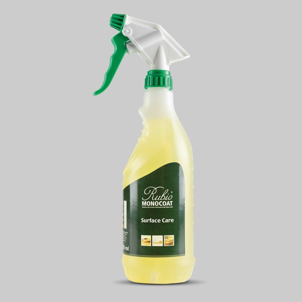 Rubio surface care cleaner spray bottle with green and white nozzle on a grey background