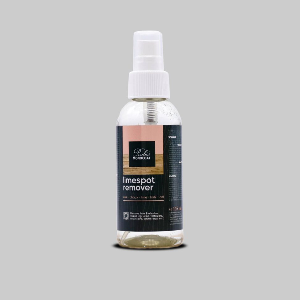 Bottle of Rubio limespot remover on a grey background