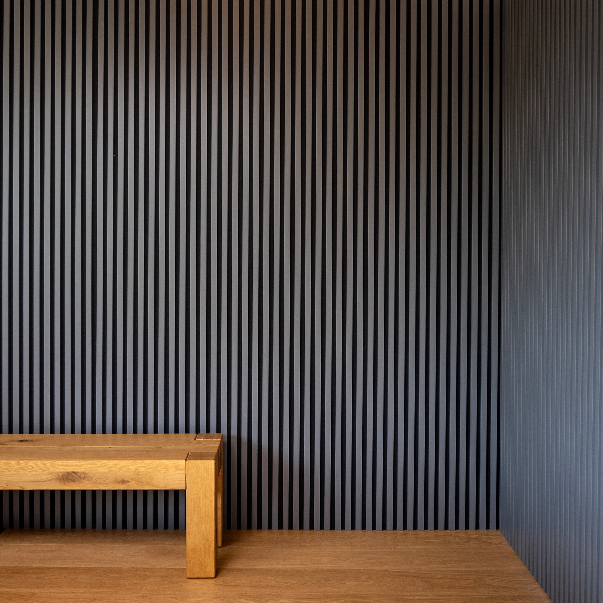 dark grey slatted wood wall panels