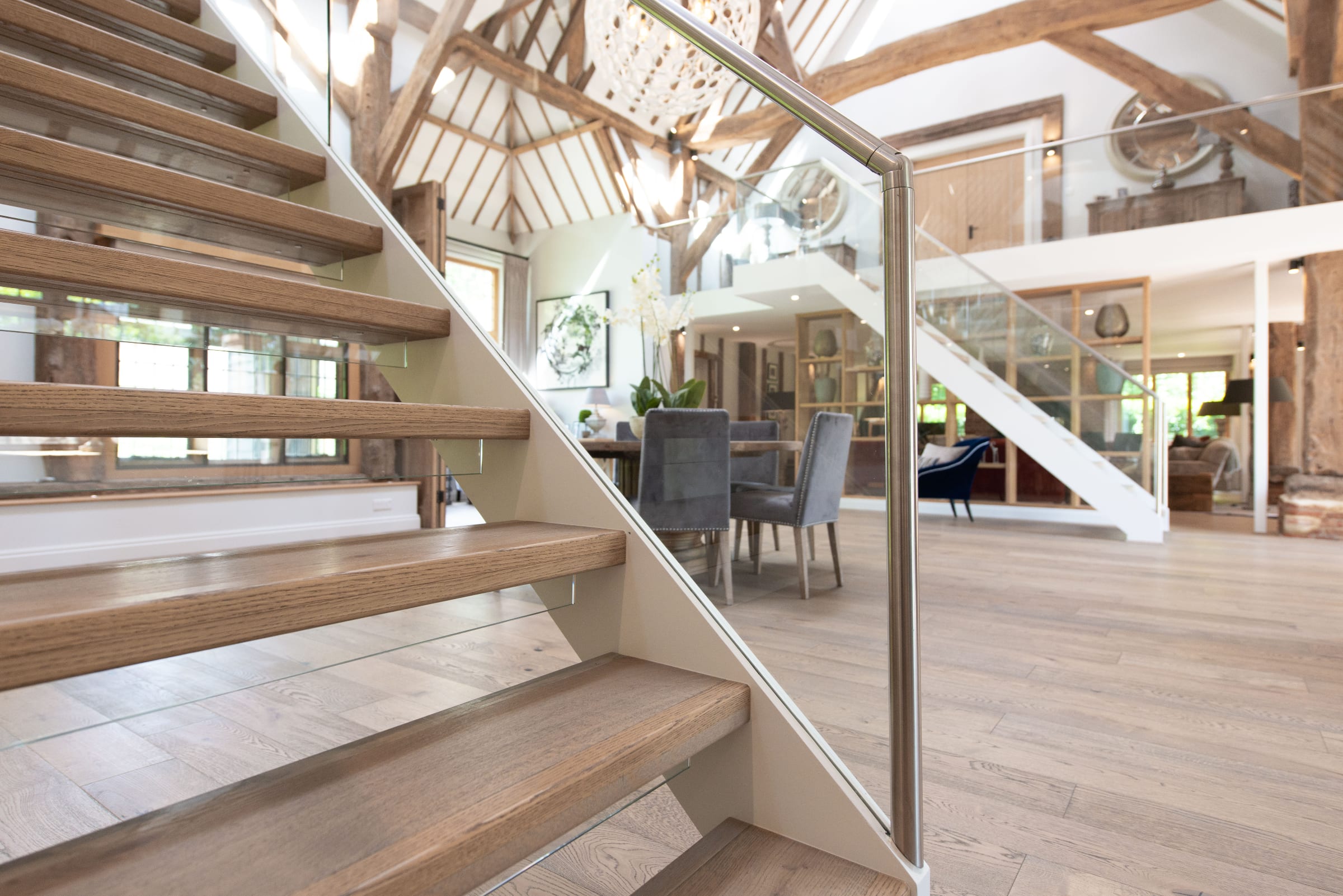 Step up your stair design with real wood floors for a seamless floor finish