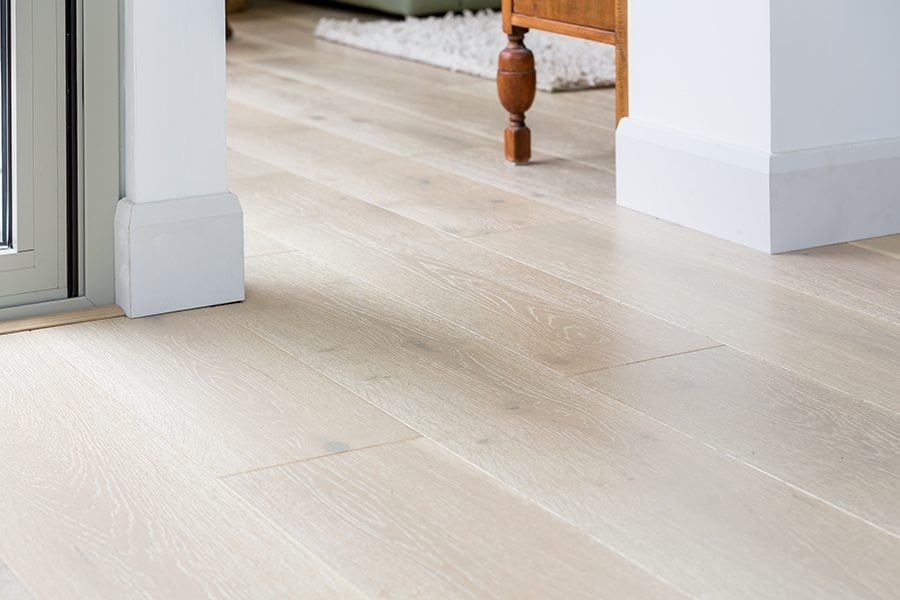 Follow the trend for lighter tones and muted wood floor finishes