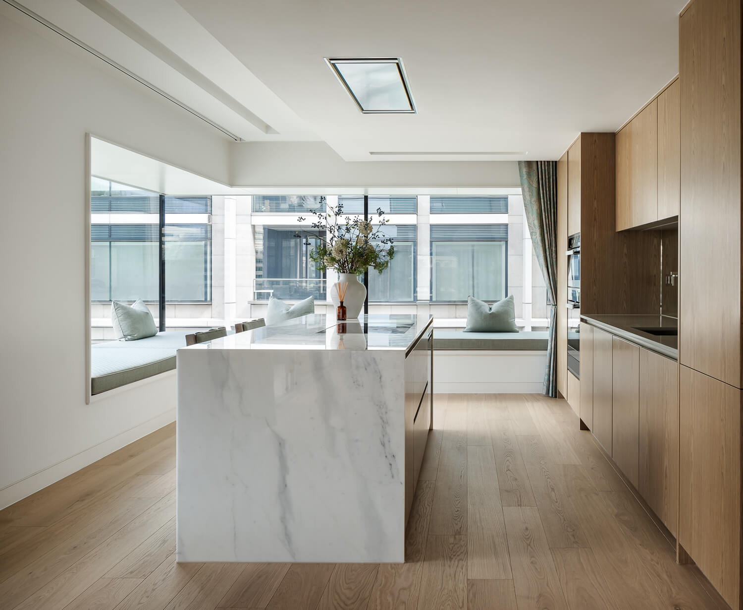 Apartment kitchen with Tundra Seashell engineered wood flooring