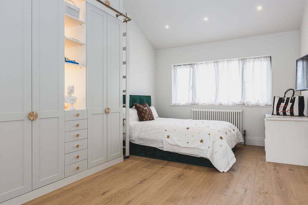 Bedroom design with built in wardrobes and engineered oak wood floors