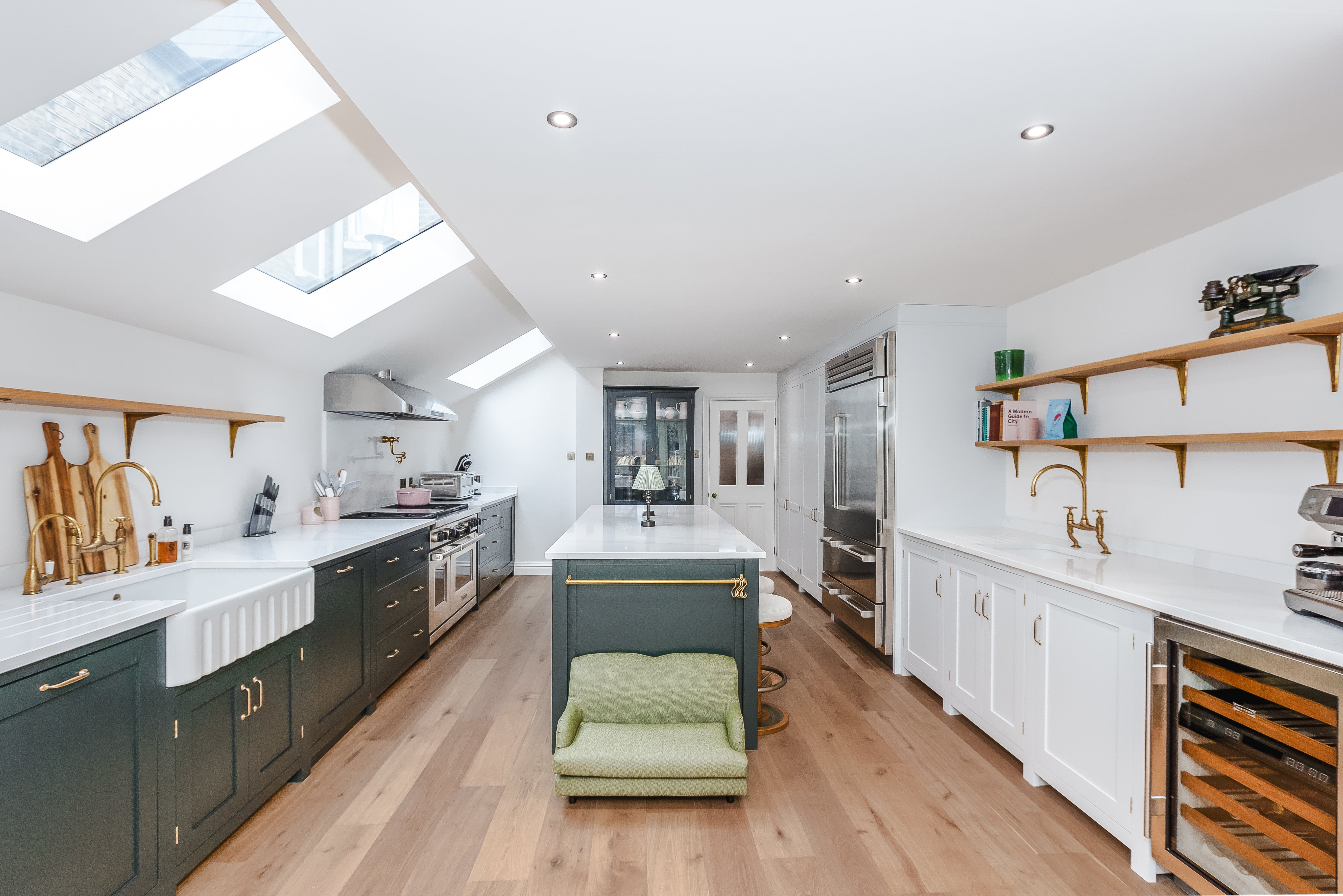 V4 Deco Smoked White Oak planks in a green and white kitchen