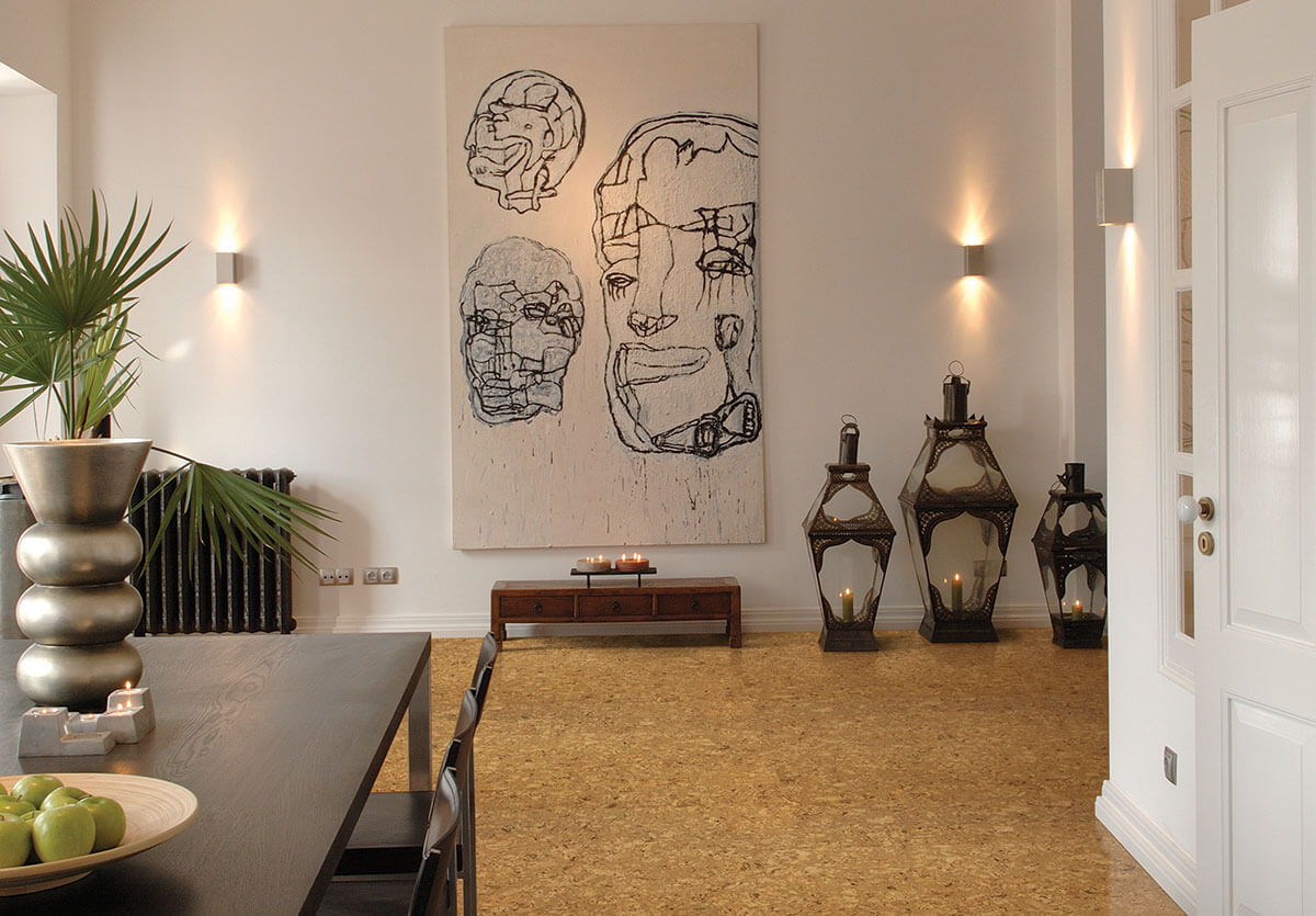 Modern interior with abstract wall art, and warm honey toned cork flooring