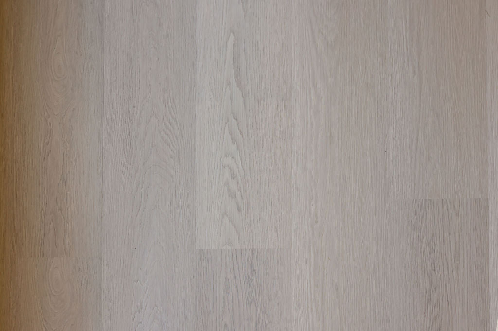 close-up of a mid-tone oak click vinyl wood floor