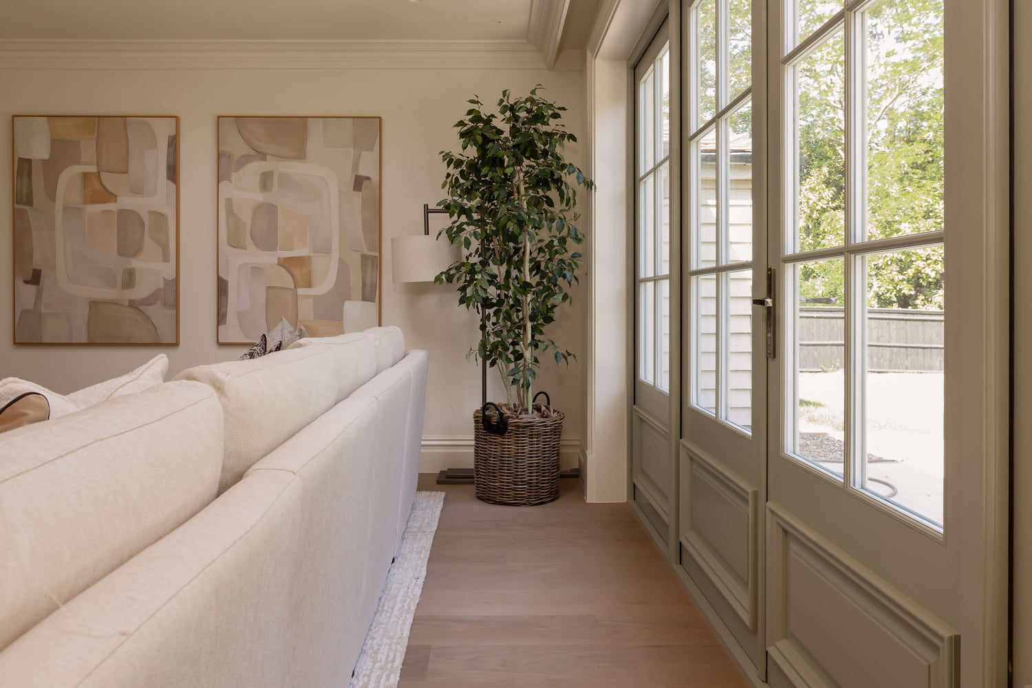 Panelled patio doors in a living room with Bjelin wood flooring
