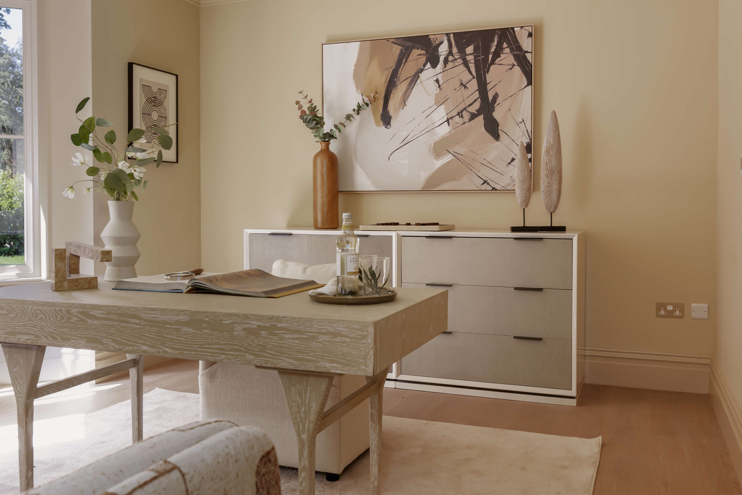 A luxurious home office with hardened engineered wood flooring