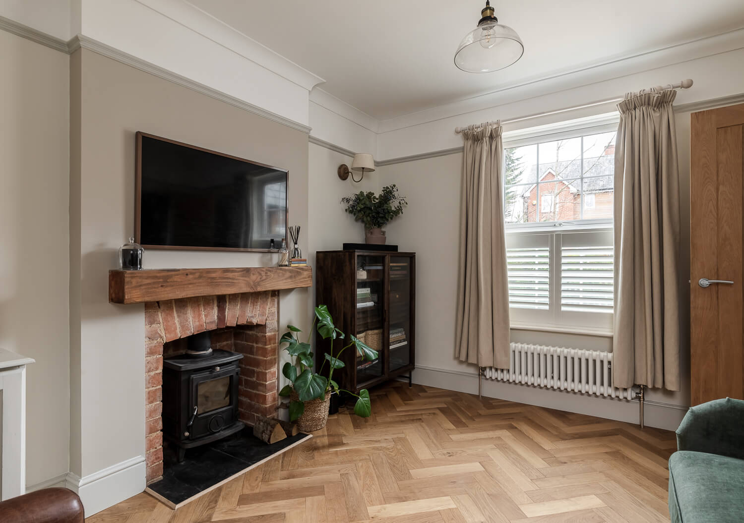 Period living room with herringbone floors