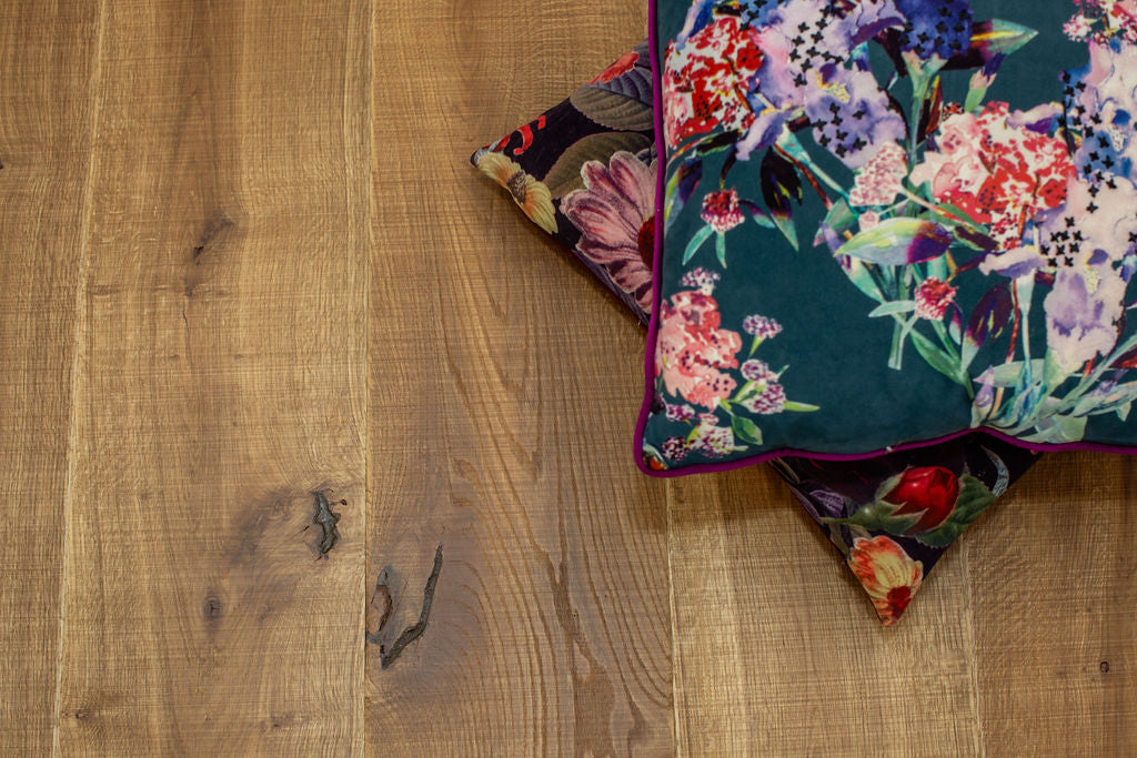 Floral cushions sitting on urban nature granite smoke wood floors