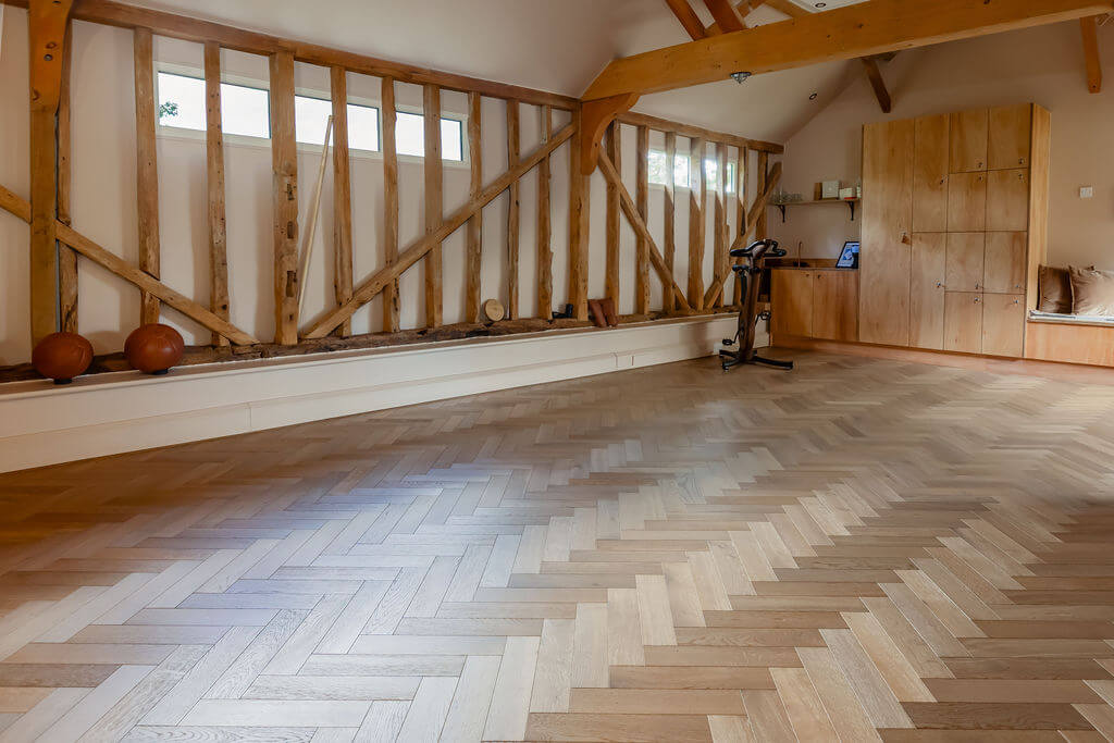 Wood floors inside The Byre private fitness studio