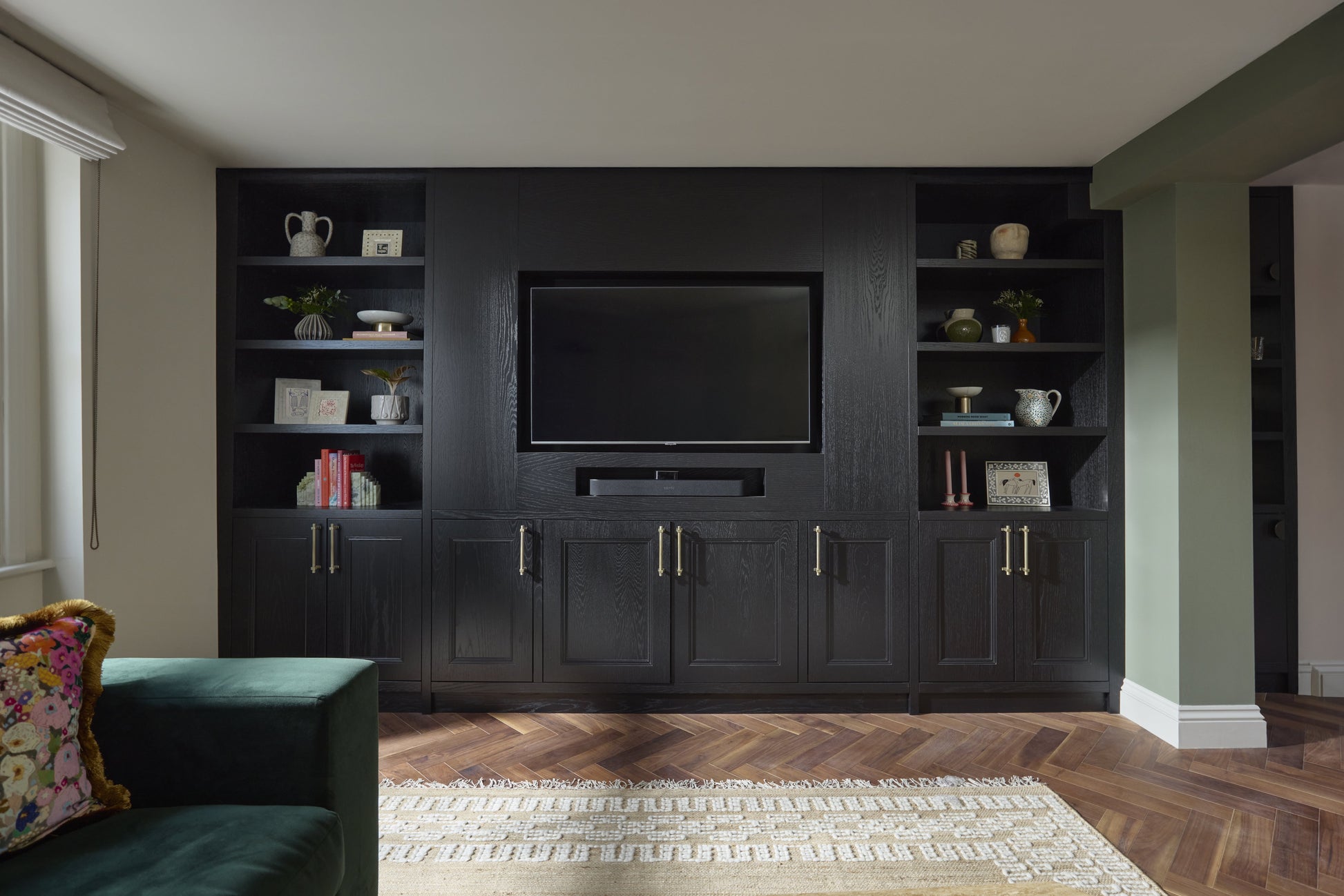 Deco American Black Walnut herringbone wood floors in a beautifully designed living space with cabinetry