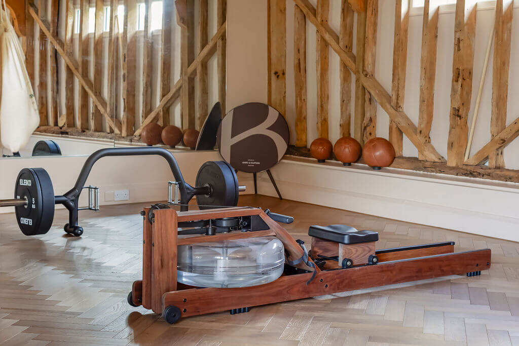 gym equipment on wood flooring