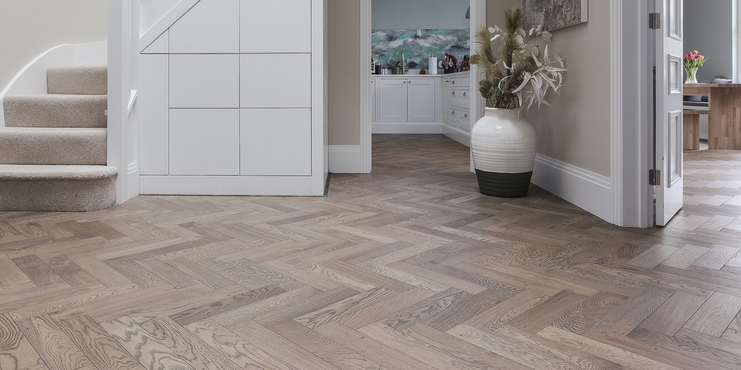 picture of v4 herringbone wood floor in a hallway
