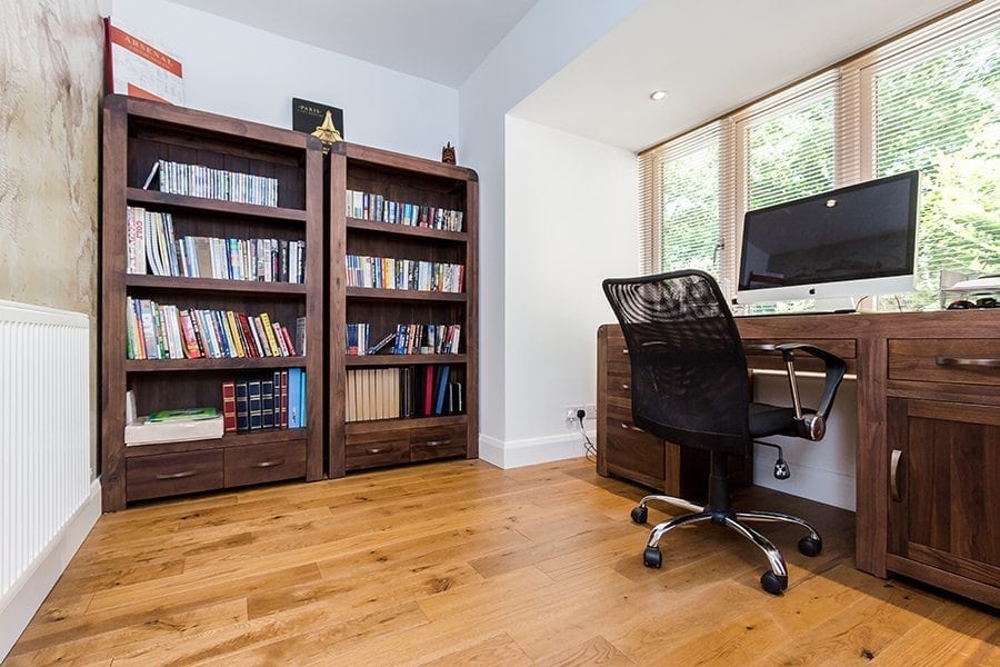 golden stained oak wood floors in a home office