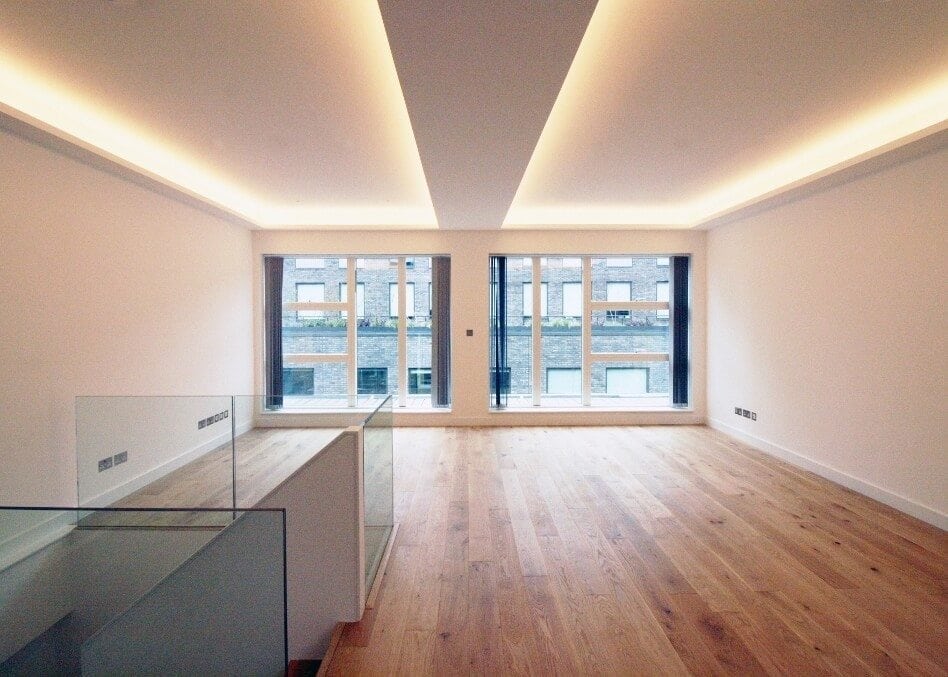 London living room with modern lighting and wood flooring