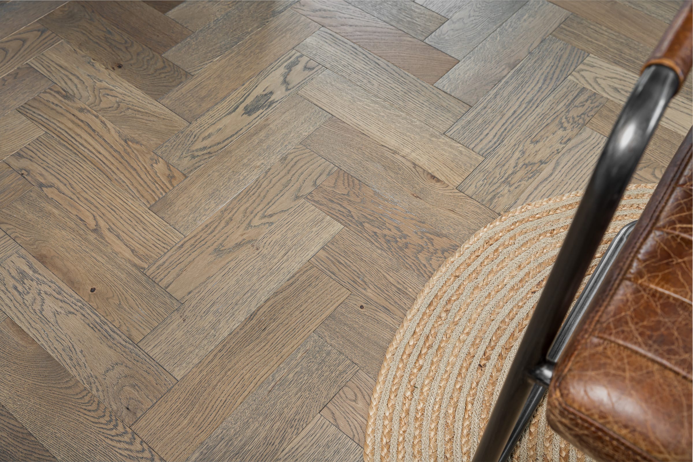 close up of herringbone wood floors