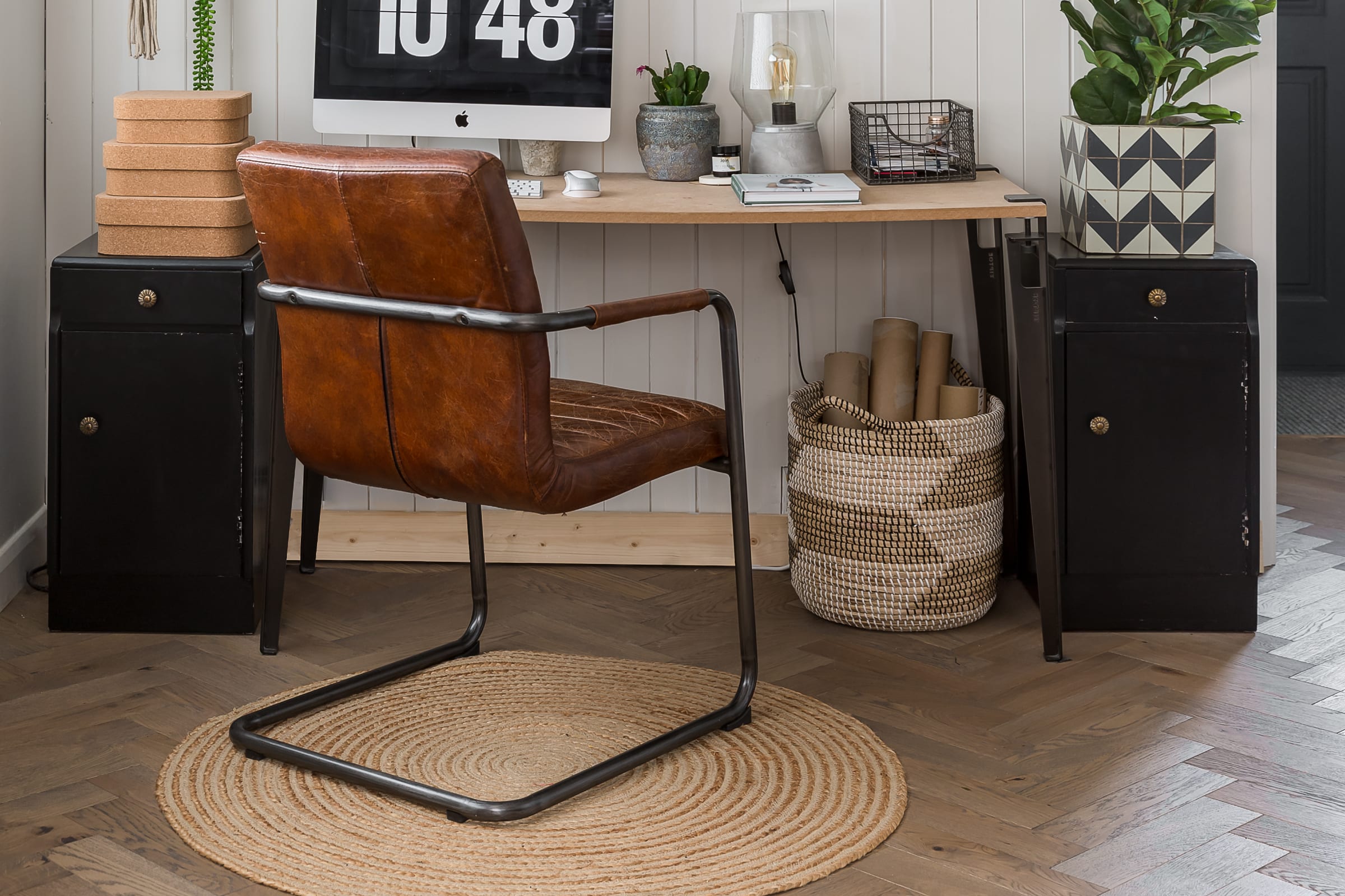 wood floors in a home office space with a mahogany leather chair