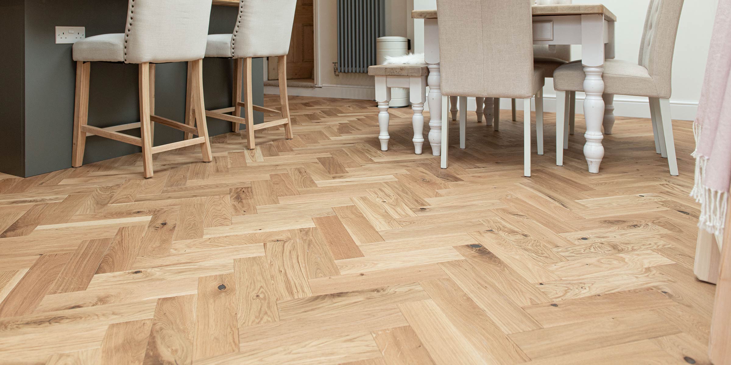 herringbone wood floor in a kitchen