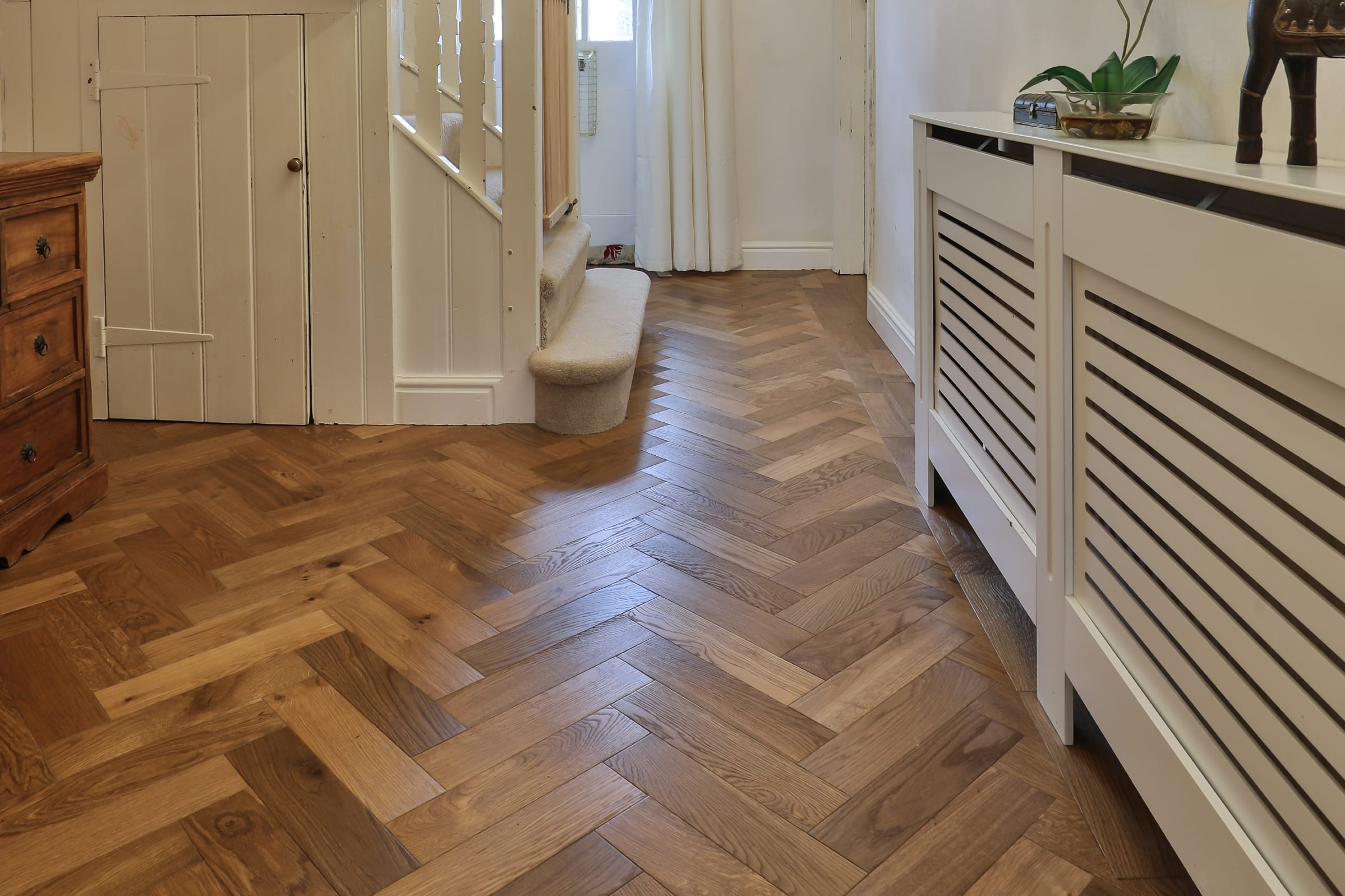 herringbone floors in hallway design