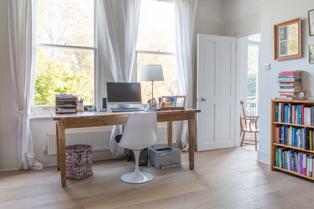 nordic beach light wood flooring in a bright and airy home office