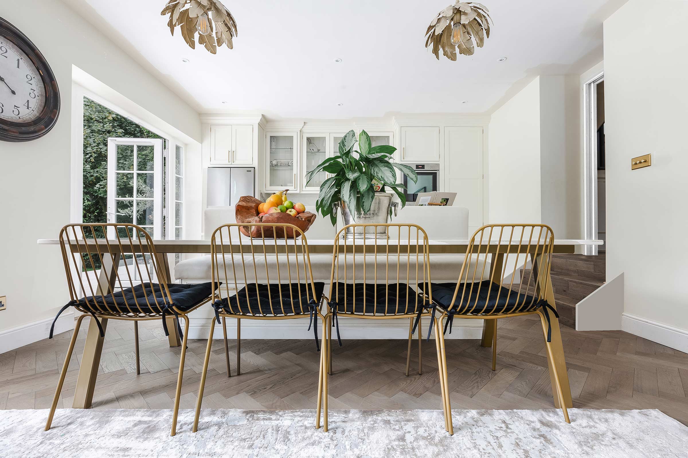 herringbone wood floors in a luxurious dining room