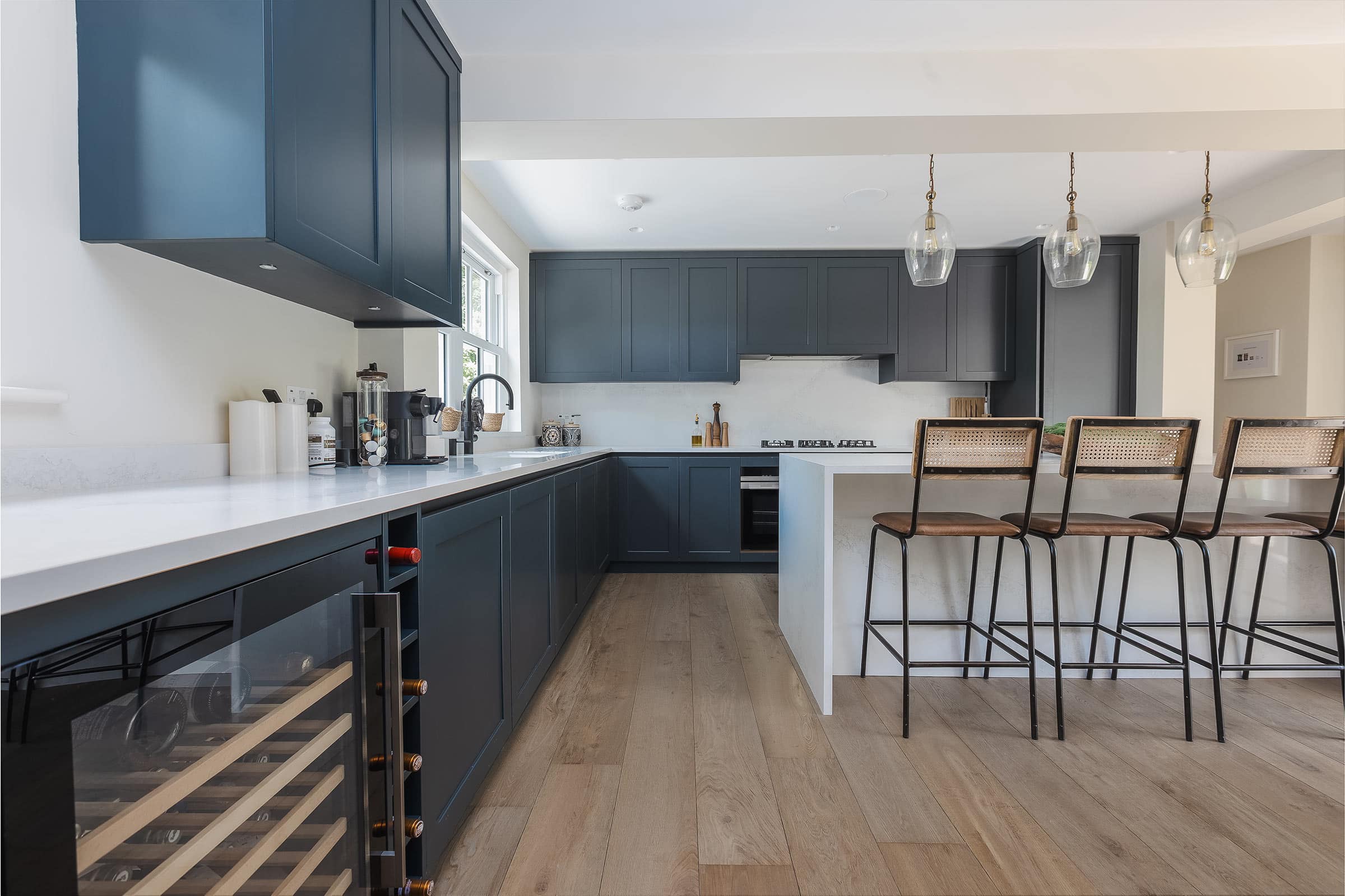 modern kitchen with oak wood floors