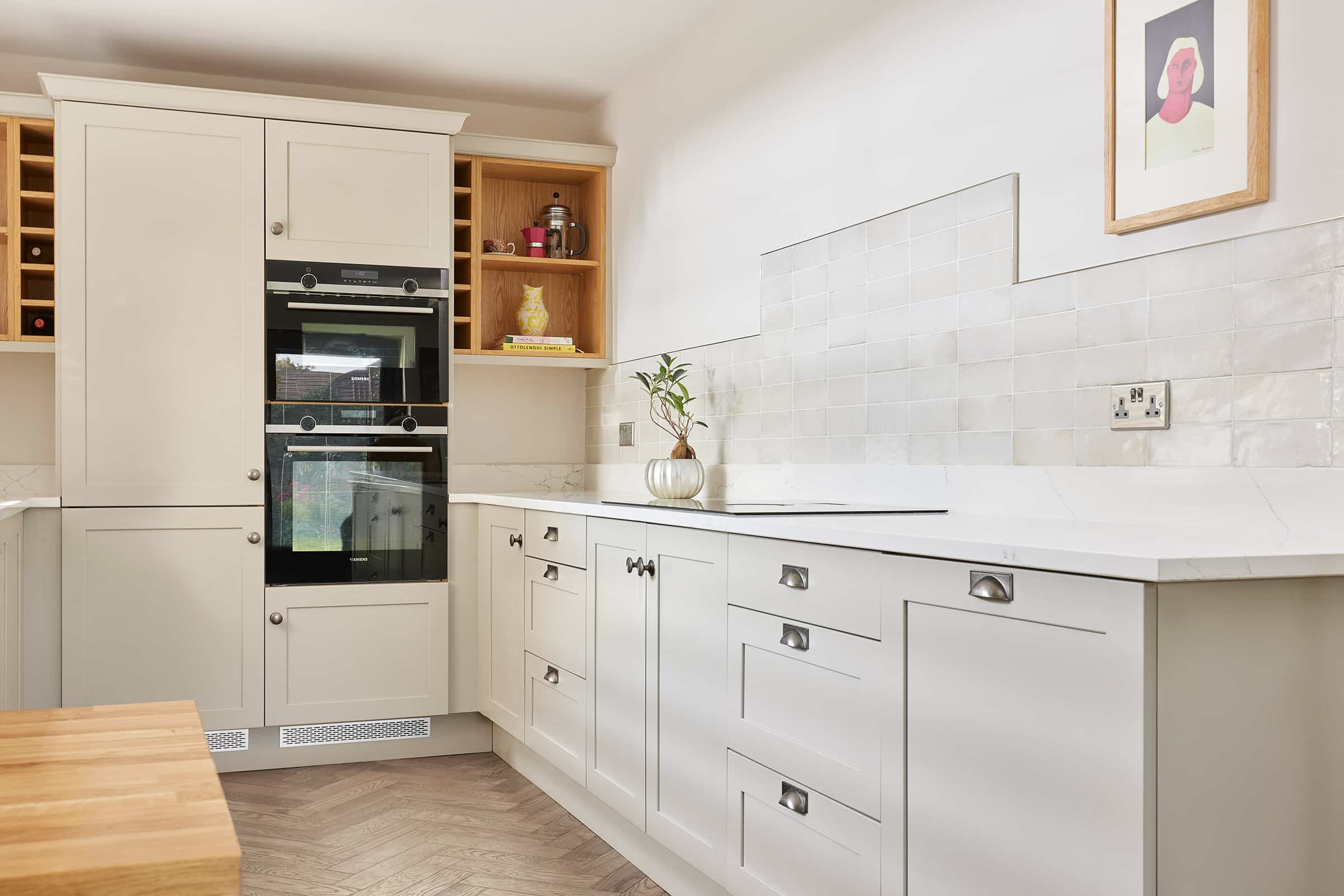 herringbone wood floors in a modern kitchen